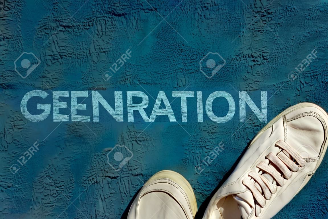 New life concept, Sport shoes and the word GENERATION written on blue walk way ground, Motivational slogan.