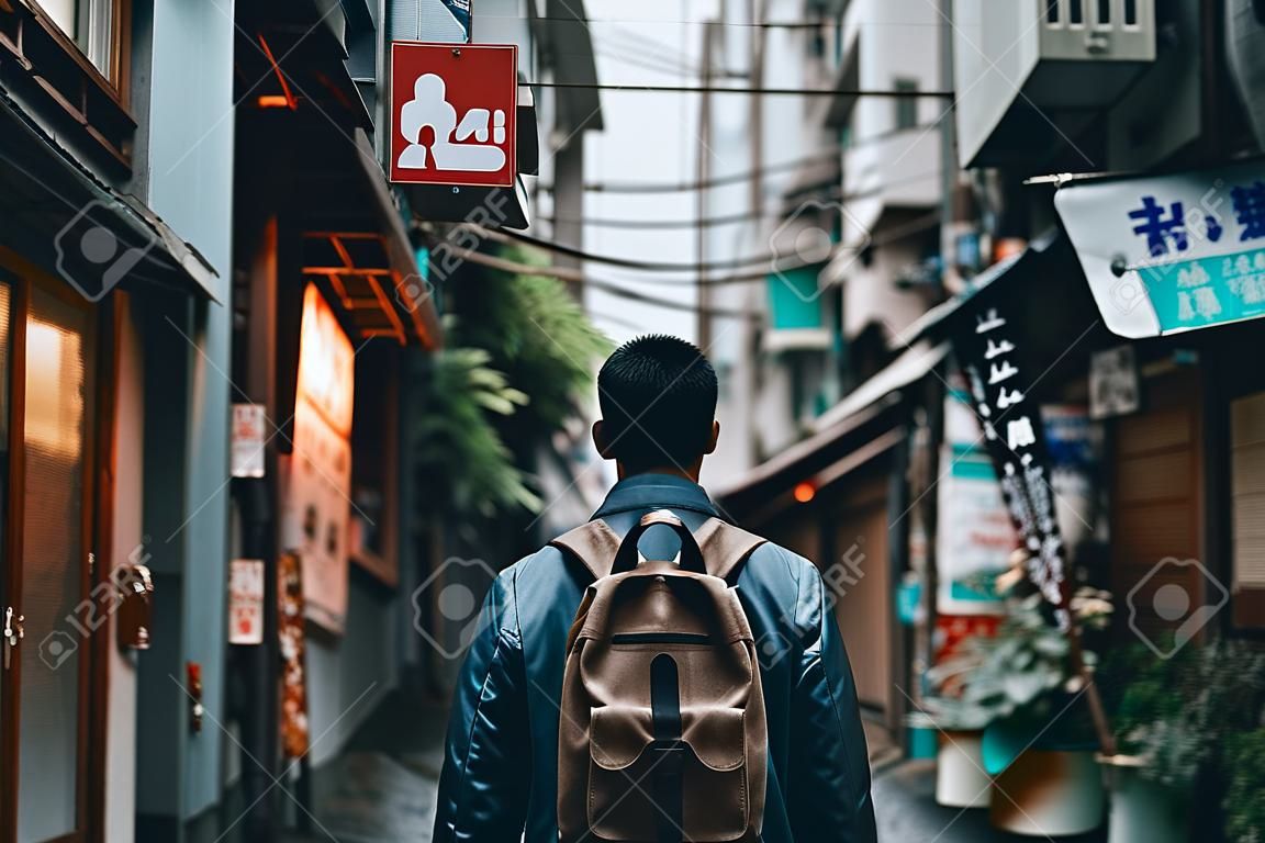 A man with a backpack walking down a narrow street. AI generative image.