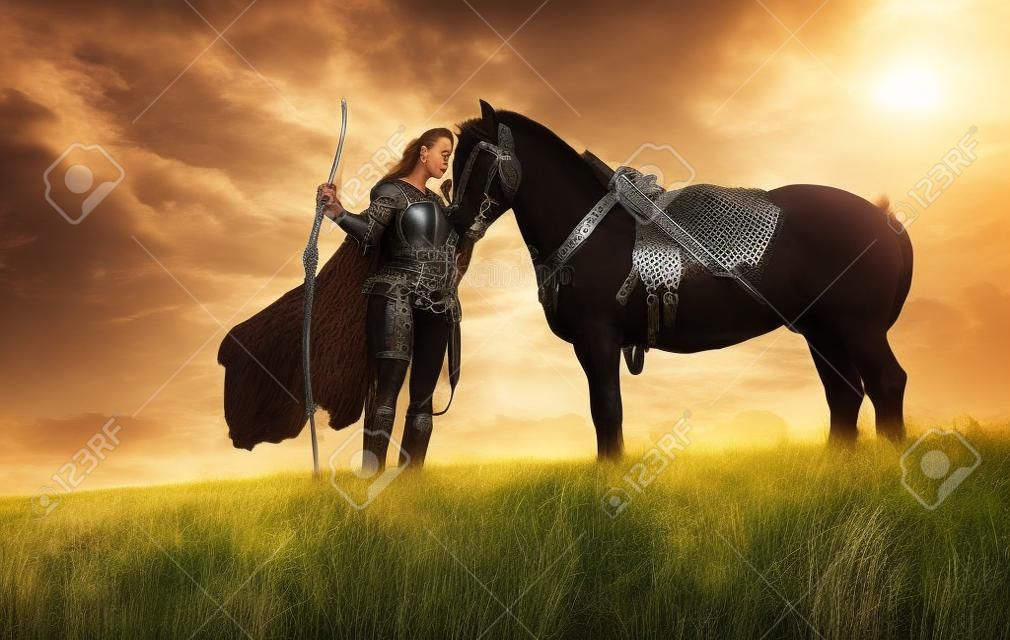 Woman in chain mail in image of medieval warrior stands with bow in her hand near horse in field.