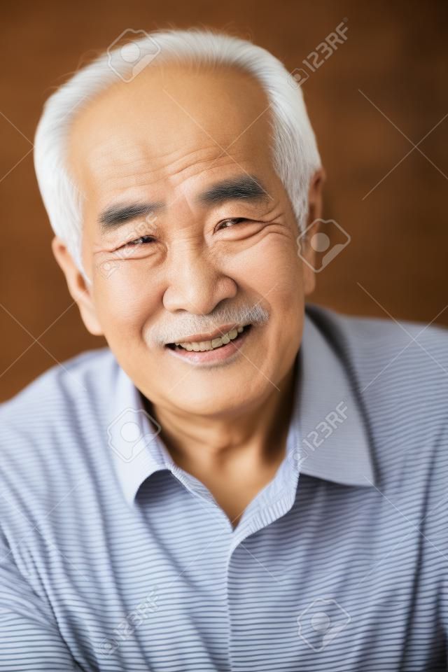 Senior Asian man at home