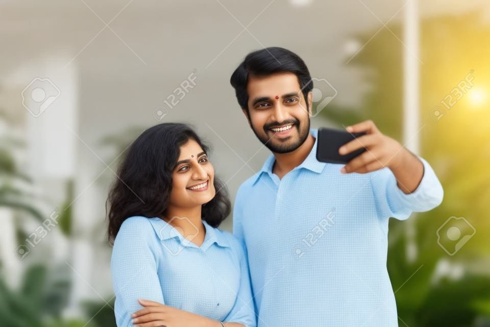 Indian couple on a video call using mobile phone