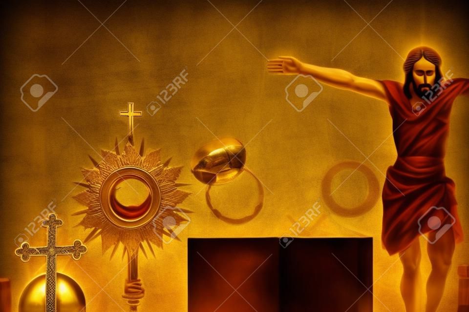 Simboli della religione cattolica. La Croce, l'ostensorio, la figura di Gesù, la Sacra Bibbia e il calice d'oro sul tavolo in legno rustico.
