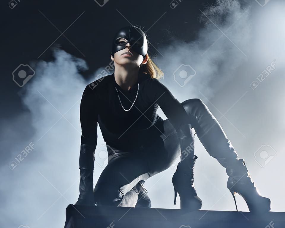 Female thief in black mask