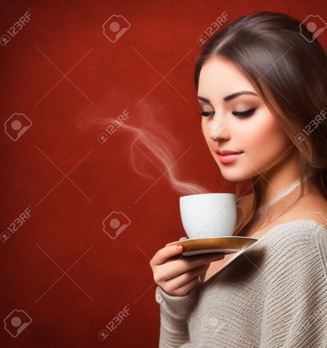 Coffee  Beautiful Girl Drinking Tea or Coffee