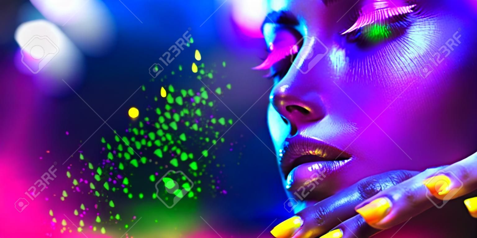 Fashion woman in neon light, portrait of beauty model with fluorescent makeup