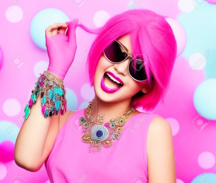 Beauty teenage model girl with pink hair, fashion colorful accessories and sunglasses
