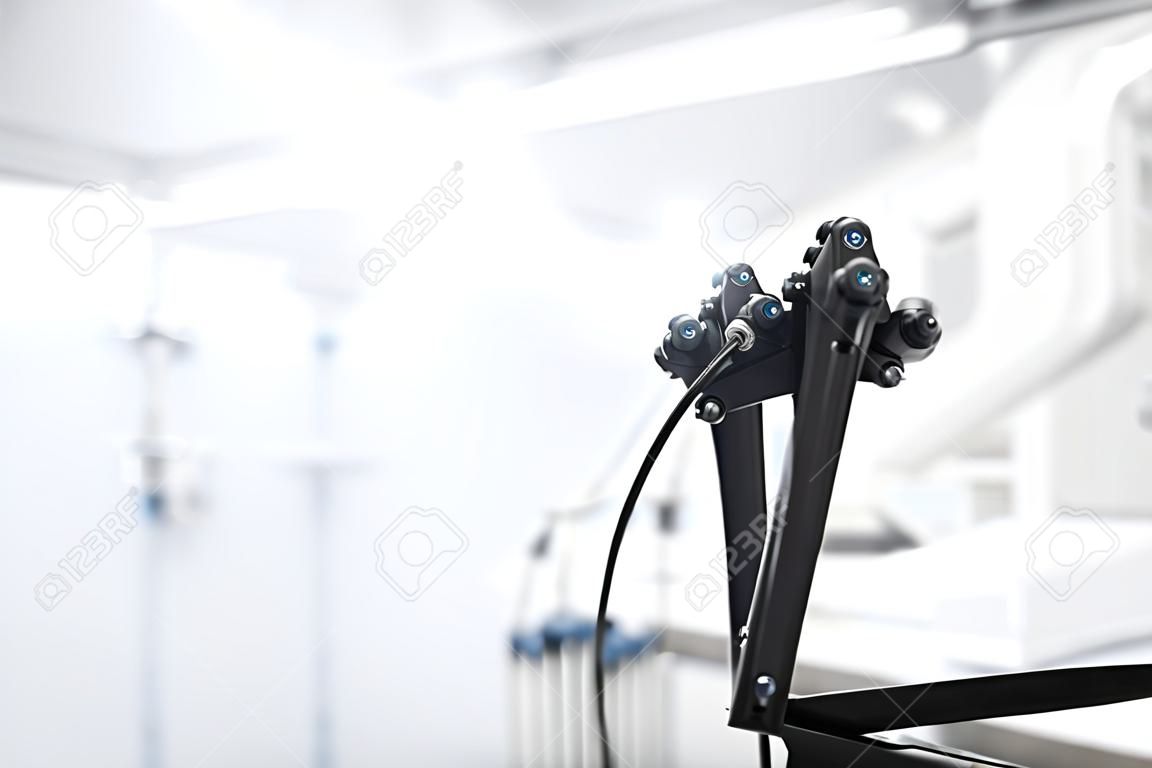 The bronchoscope is ready for operation and is located in a modern laboratory with a mass of equipment. Image with space for text.