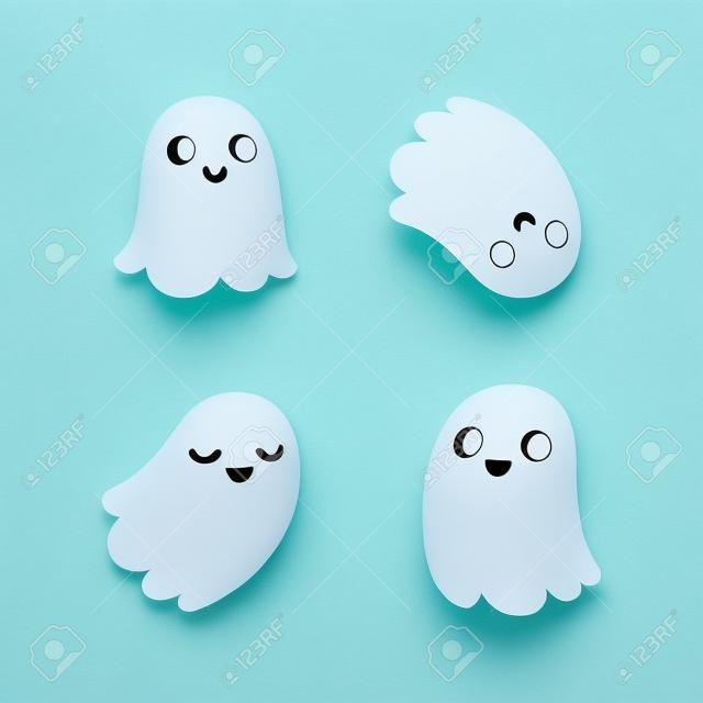 Set of four adorable cartoon ghosts with different facial expressions.