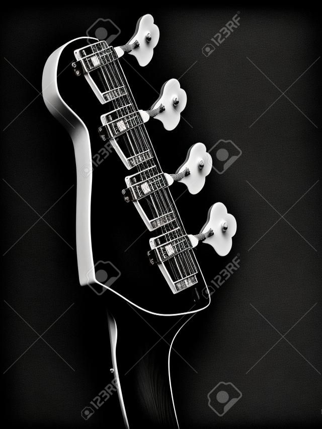 Schwarz-Weiß-Foto von einem Bass-Gitarren-Kopfplatte auf schwarzem Hintergrund.