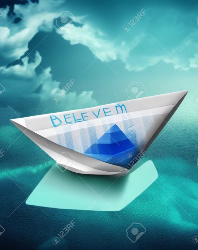 	Paper boat on water  Concept Believe in Dream