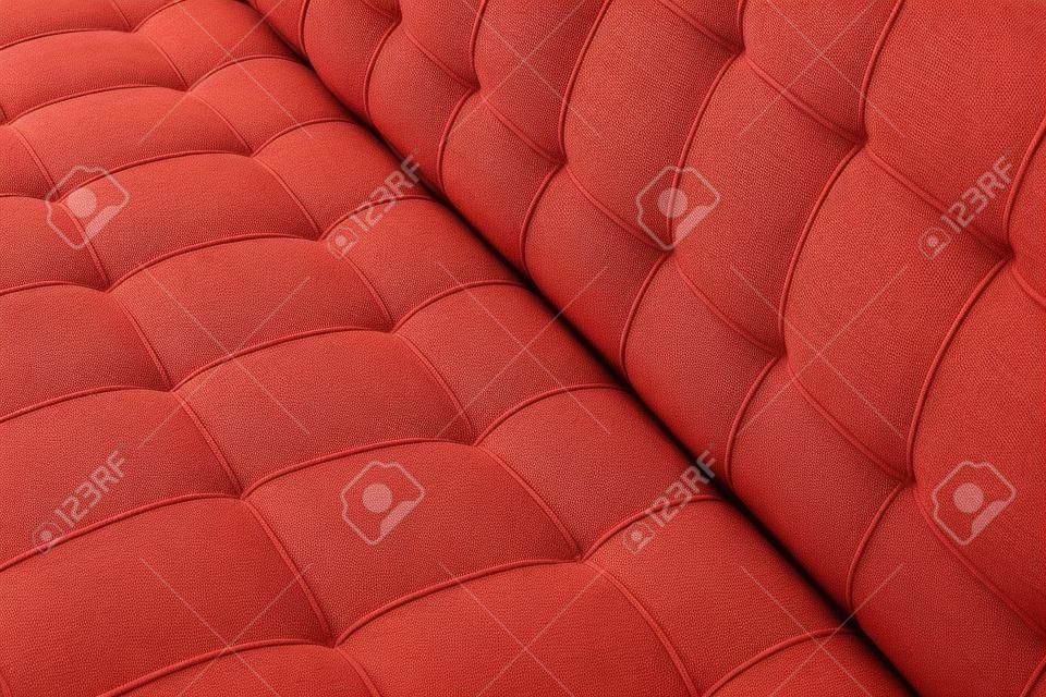 赤いカバーの柔らかい綿布の細かい縫製ソファのテクスチャの詳細。家具の背景の生地のパターン。