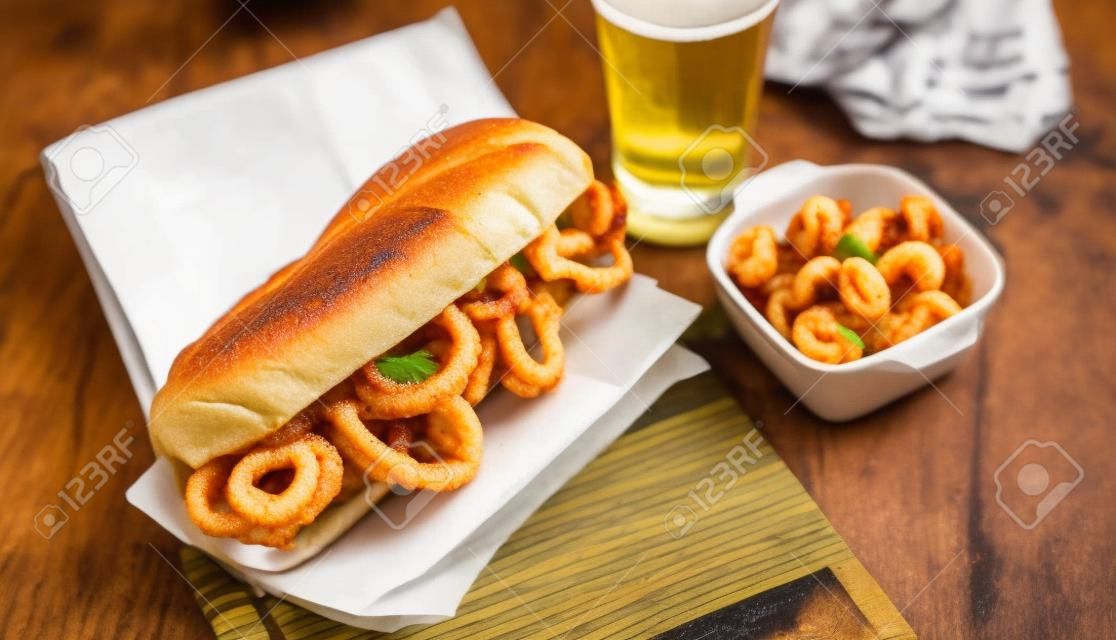 bocadillo con calamares or squid sandwich with beer, very popular in Madrid spanish typical tapas