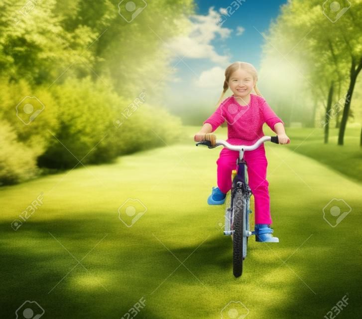 little girl with her bicycle
