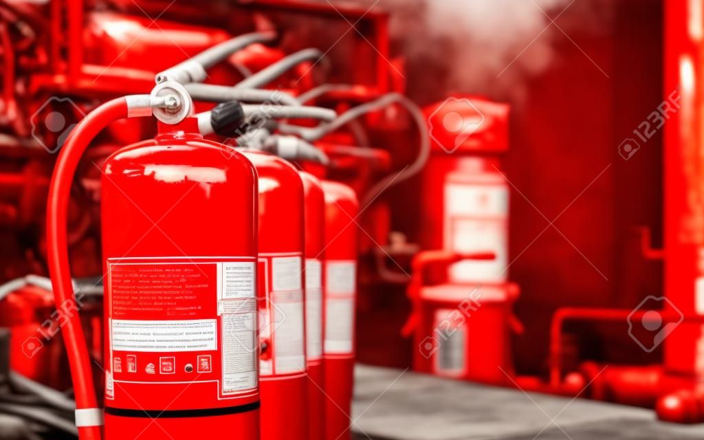 Red tank of fire extinguisher Overview of a powerful industrial fire extinguishing system.