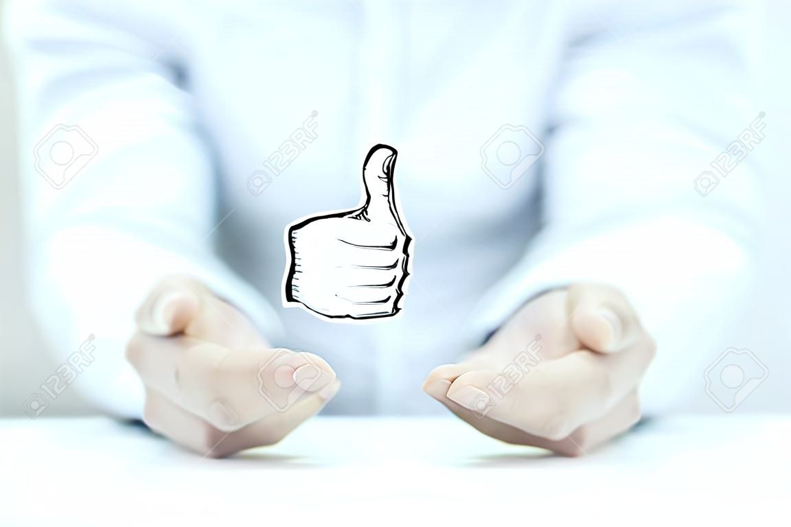 Man palm opening showing thumb up on white background