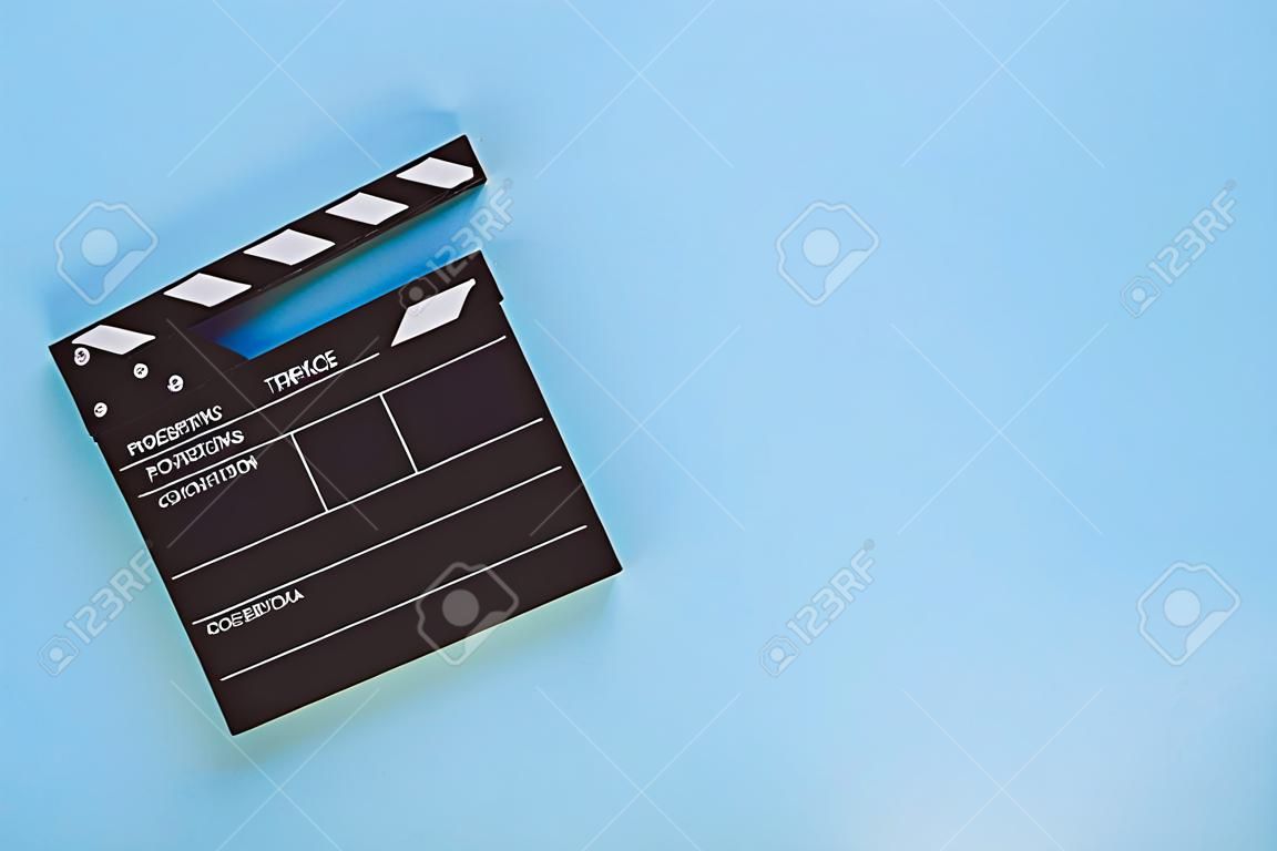 black clapperboard with free space for text isolated on color background