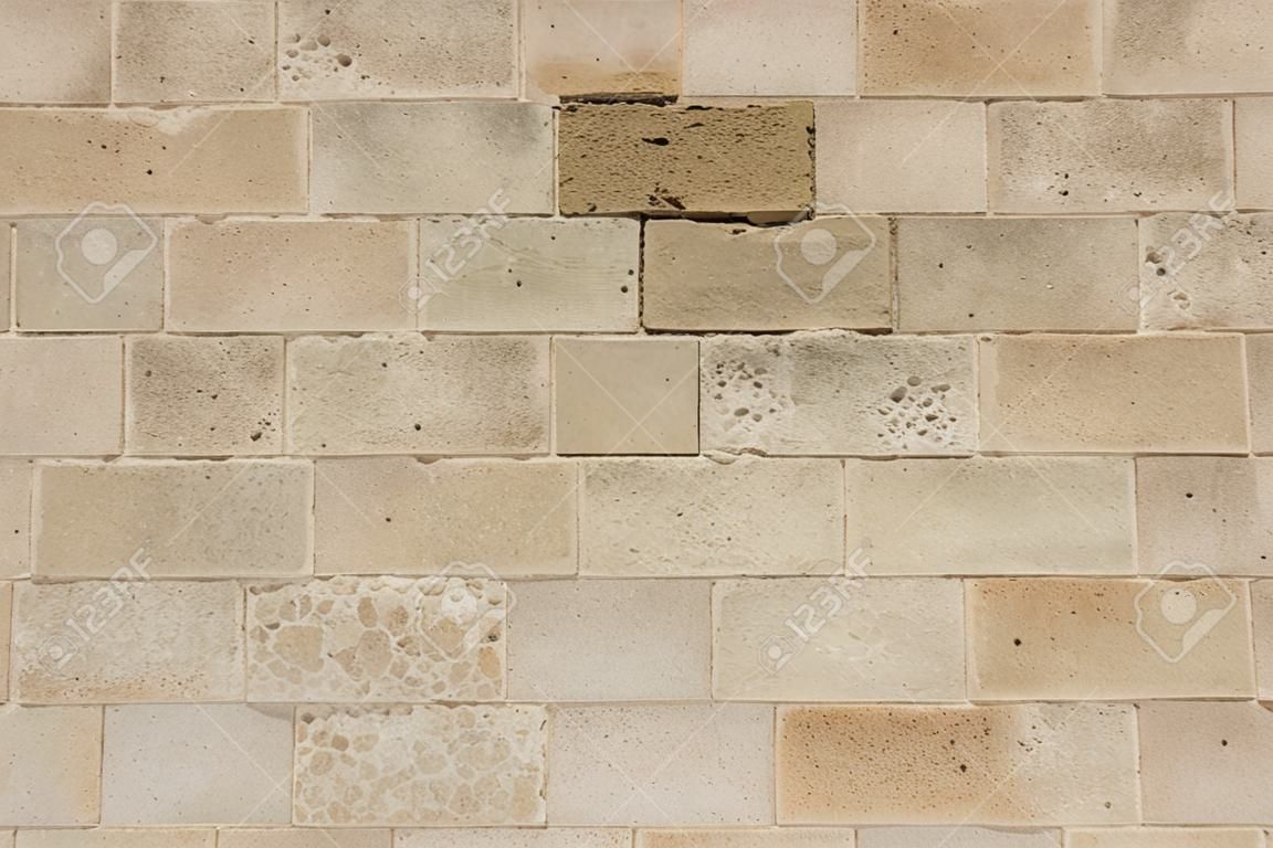 piedra textura de los azulejos en la pared exterior de una iglesia