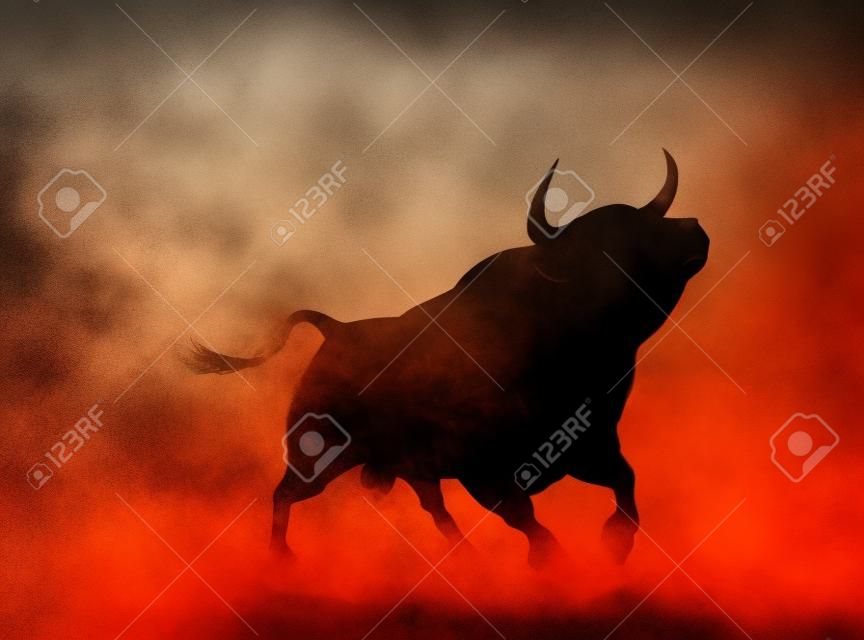 煙やほこりの多い雰囲気の中で、怒っている雄牛のシルエットの図