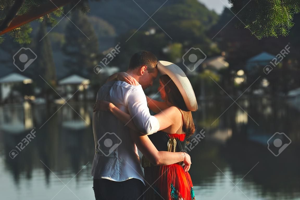 beautiful couple on nature by the lake