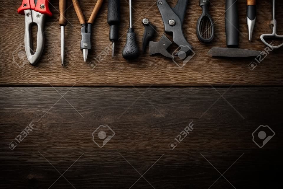 Various tools on a wooden background