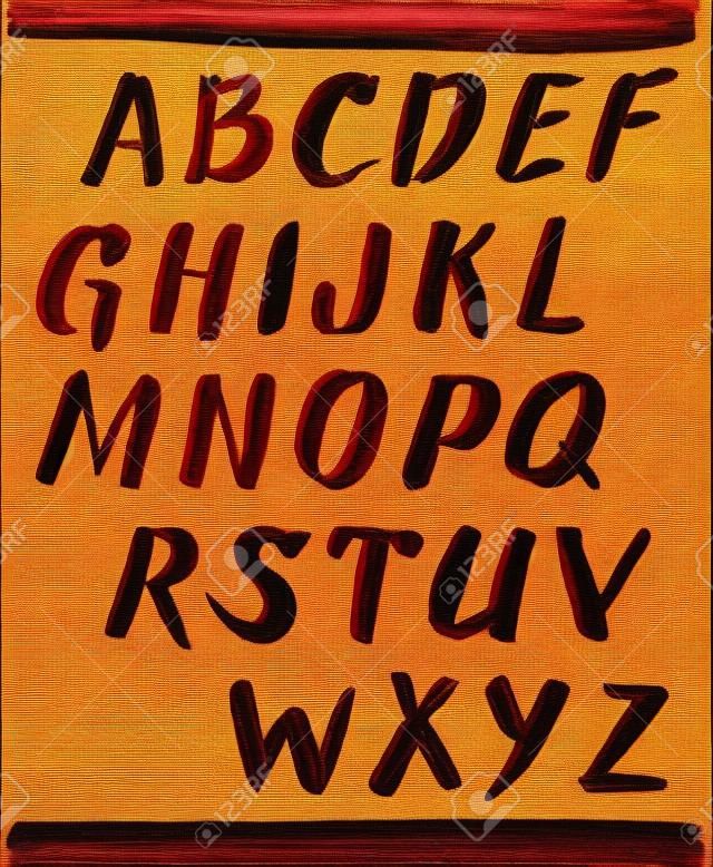 Ruj ve oje yazı. El kırmızı yağlı boya alfabesi çizilmiş.