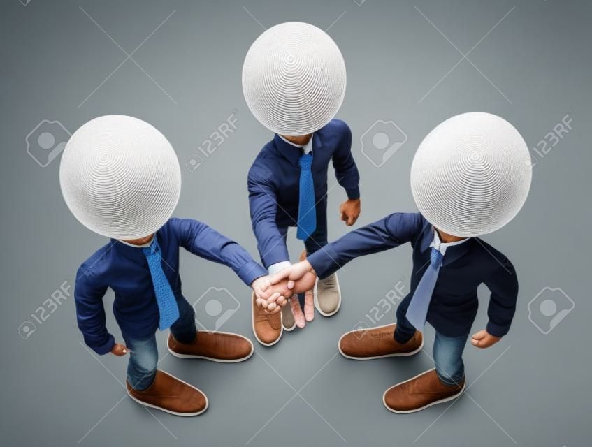 Three men shaking hands facing up