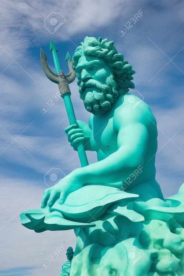 A large public statue of King Neptune  that welcomes all to VA beach in Virginia USA.