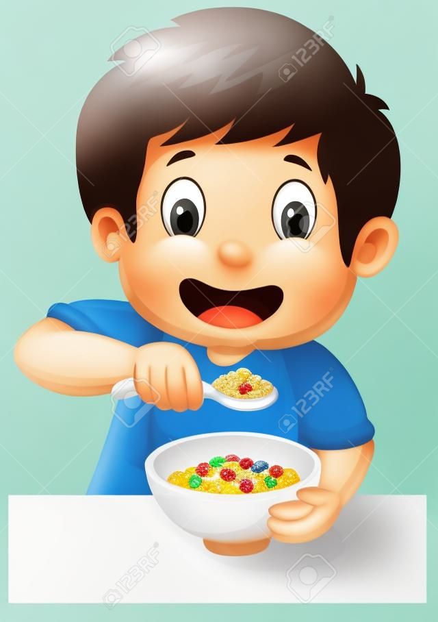 少年は朝食の穀物を持っています。