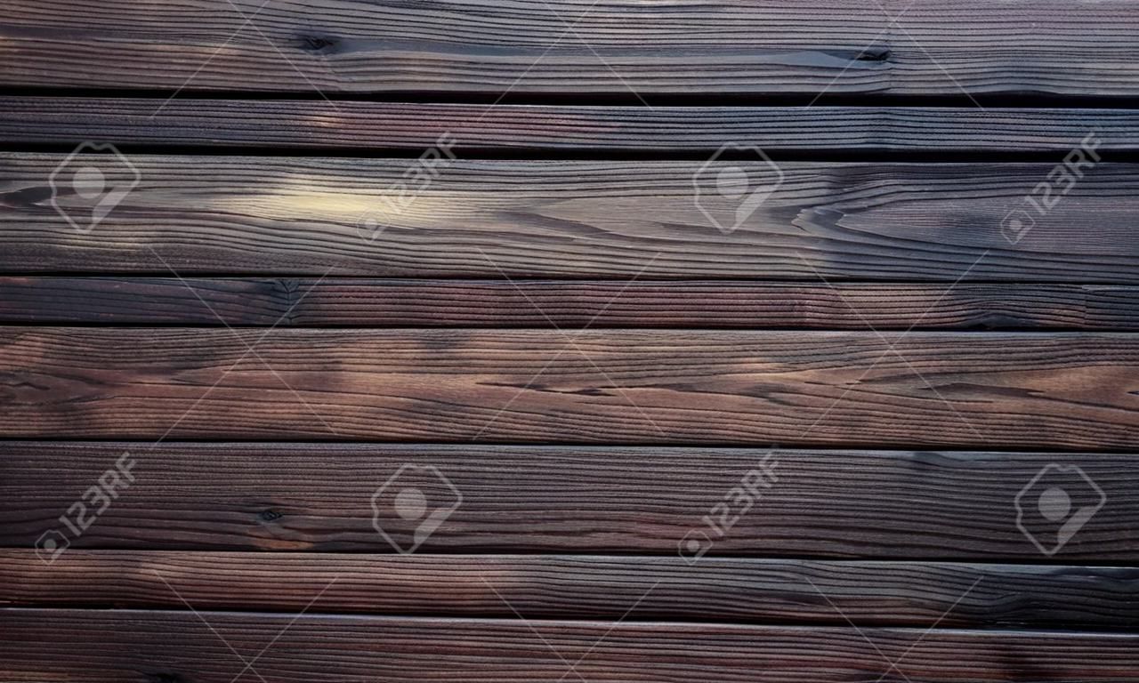 braune Holzstruktur, dunkler hölzerner abstrakter Hintergrund