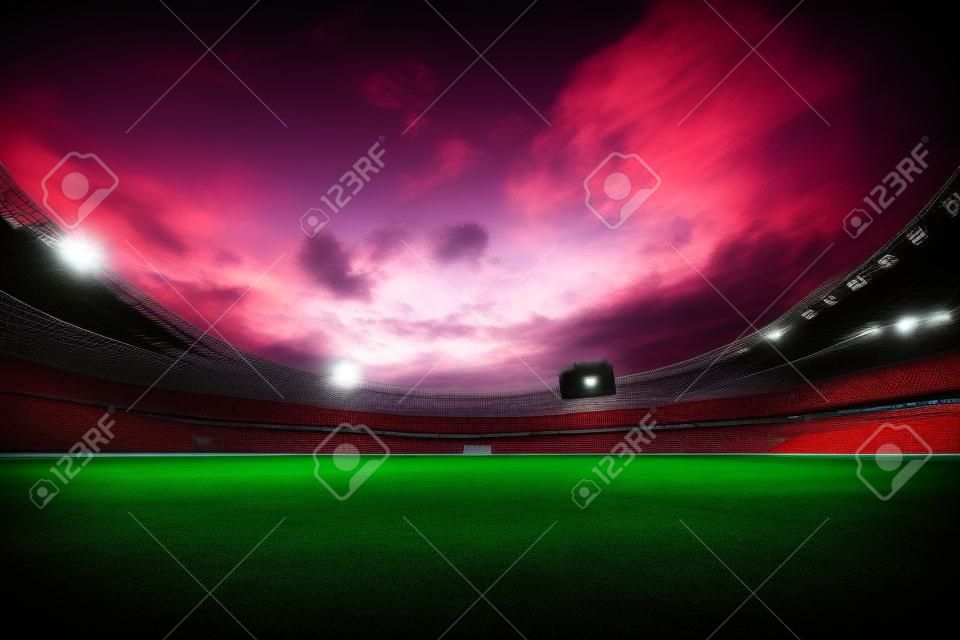 la puesta del sol vacío magnífica de la arena de fútbol en las luces
