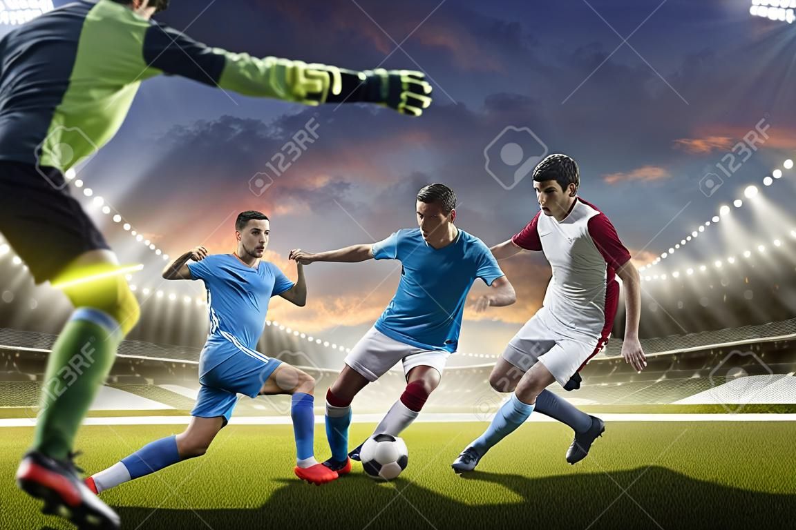 Soccer players in action on the sunset stadium background panorama