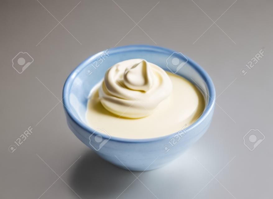 Studio shot of a bowl of cream