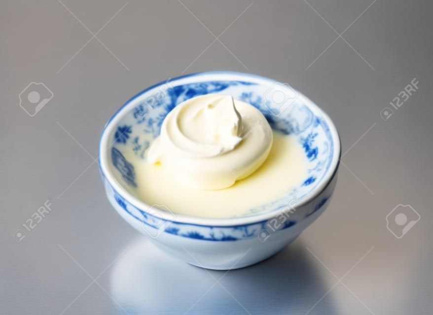 Studio shot of a bowl of cream