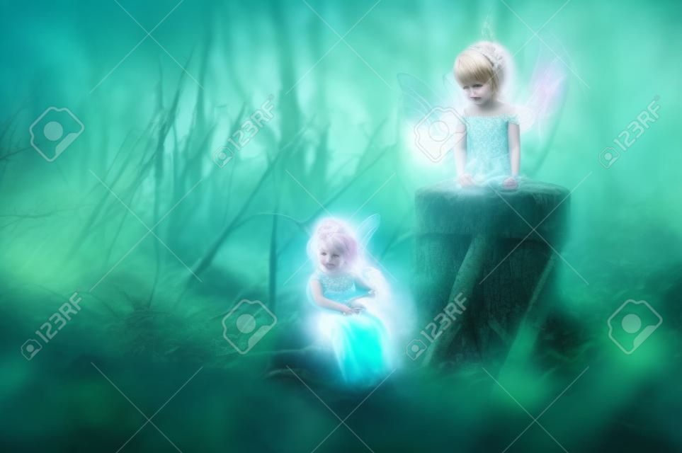 image of magical little fairy sitting in the night forest