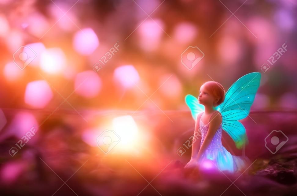 image of magical little fairy in the forest at sunset