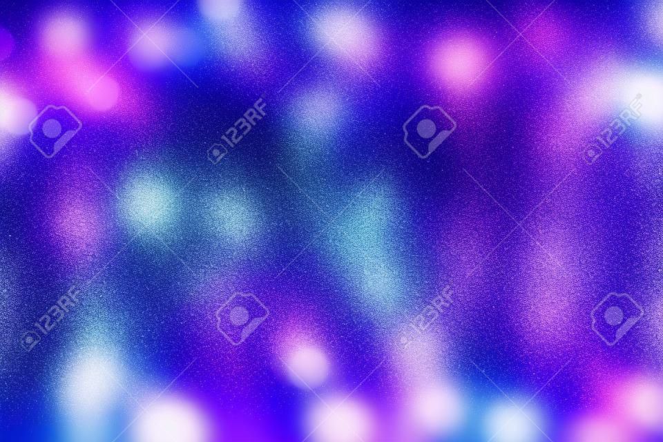 abstract glitter silver, purple, blue and gold lights background. de-focused