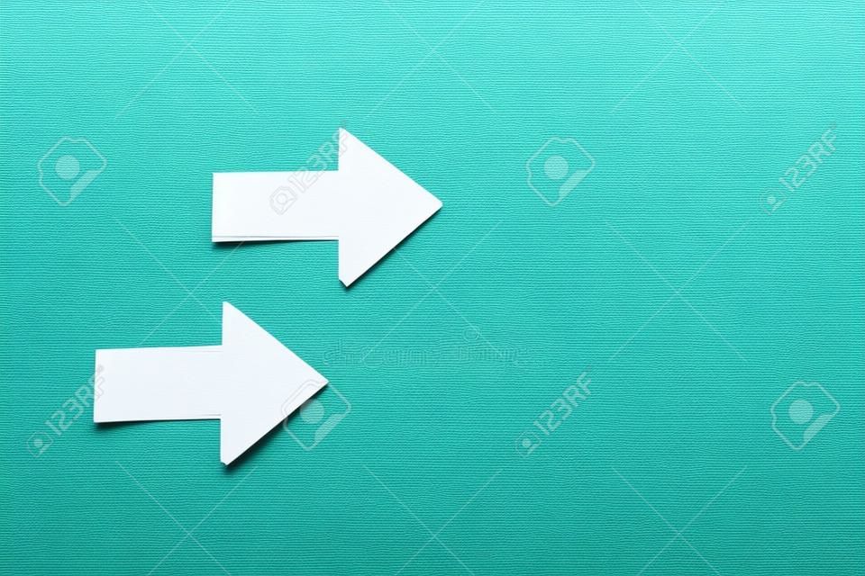 Top view image of arrows on textured paper background