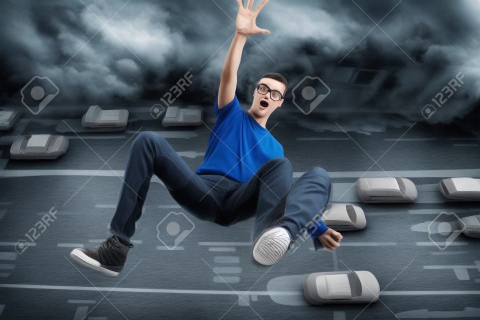 young man falling down of a building
