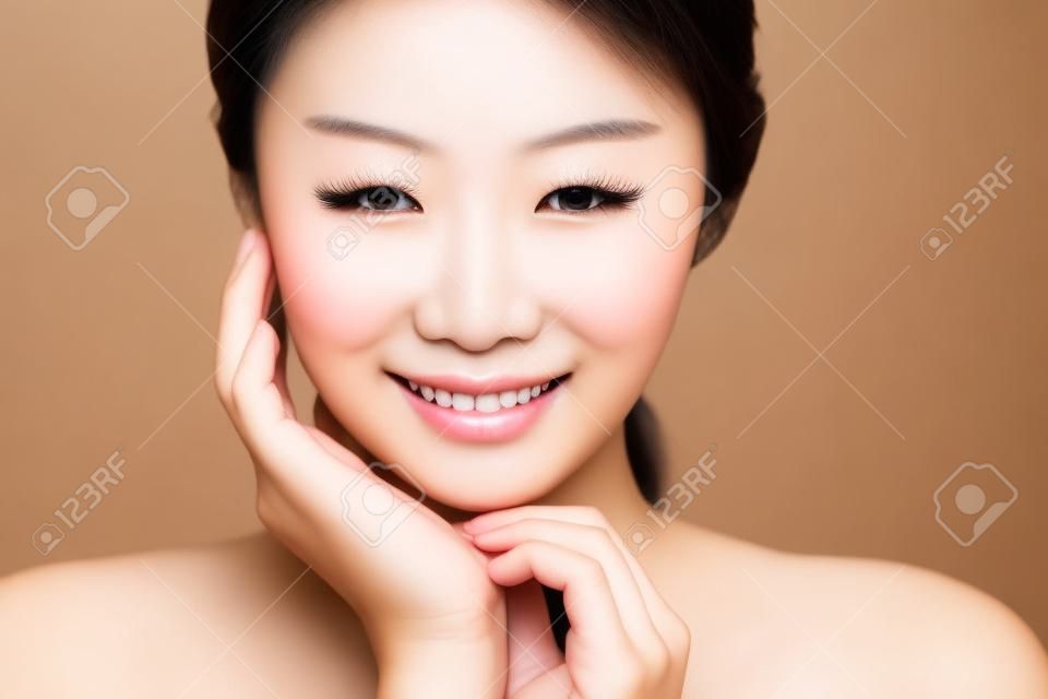 closeup smiling young  beautiful asian woman face