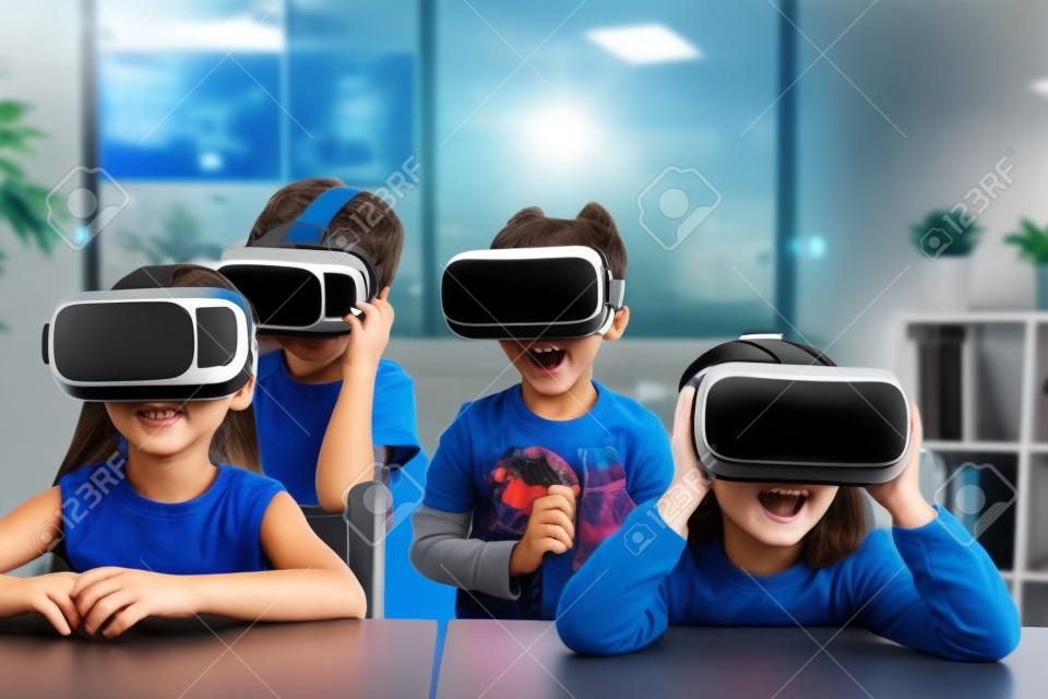 surprised students with virtual reality headset in classroom
