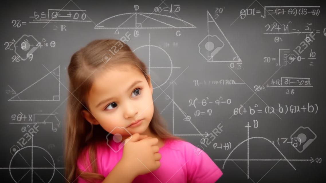 little girl thinking about mathematics problem