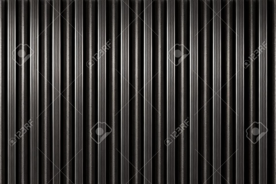 Zwart Gegolfd metaal achtergrond en textuur oppervlak of galvanisch staal