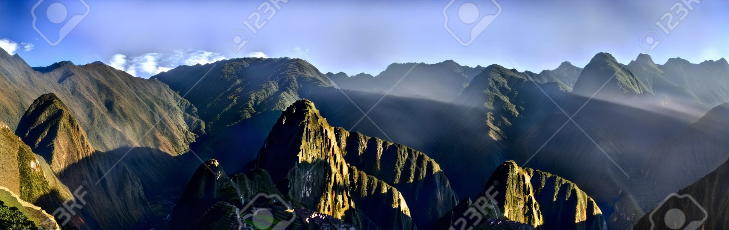 HDR Panorama of Sunrise over the Ruins Machu Picchu - Sacred city of the Incas