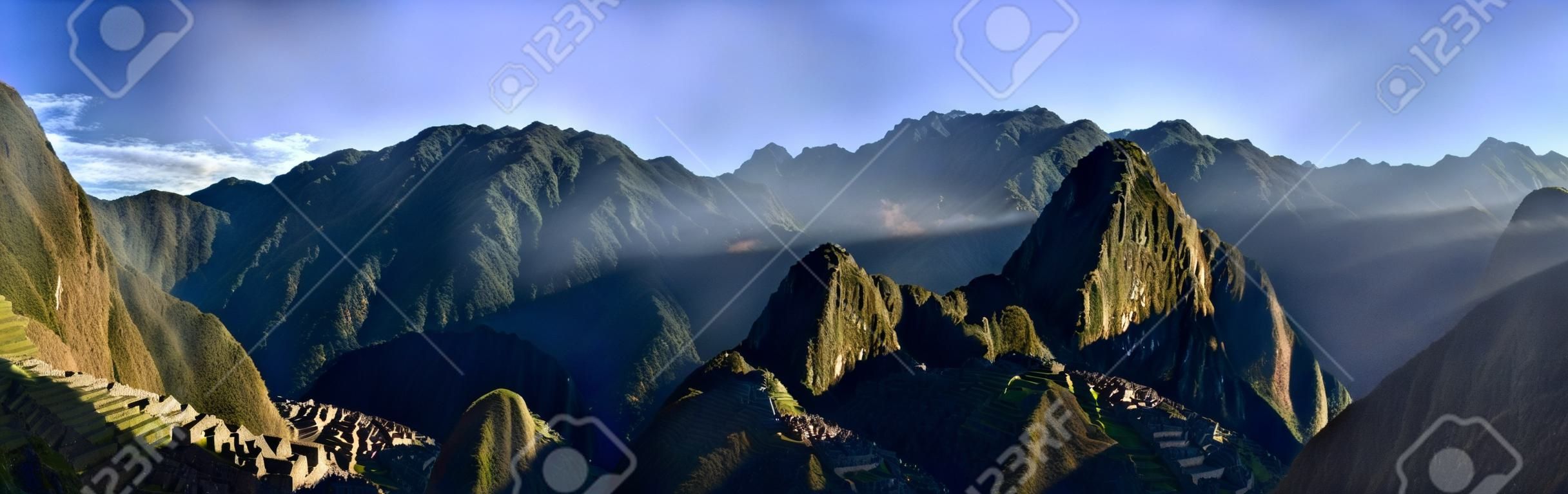 HDR Panorama of Sunrise over the Ruins Machu Picchu - Sacred city of the Incas