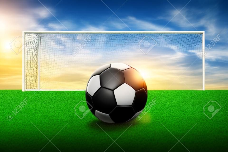 balón de fútbol en campo de hierba verde