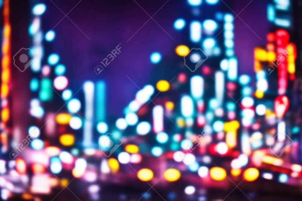 Night city lights - defocused Tokyo, Japan. Blurred neons.