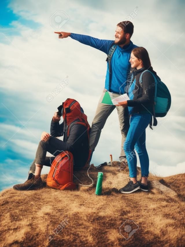 Young travelers with map