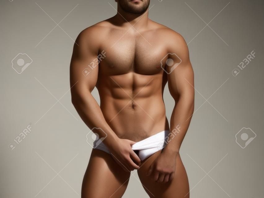Cuerpo gay sexy. Joven desnudo. Macho caliente. Cuerpo de hombre atlético.