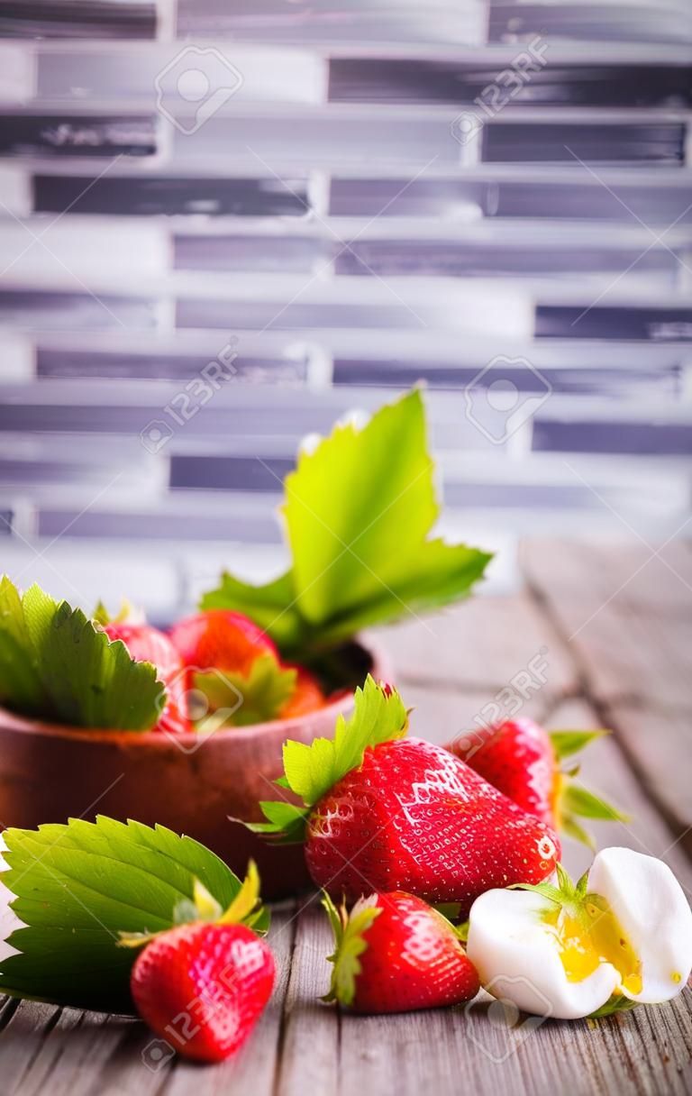 Fresh ripe organic strawberry on wooden table