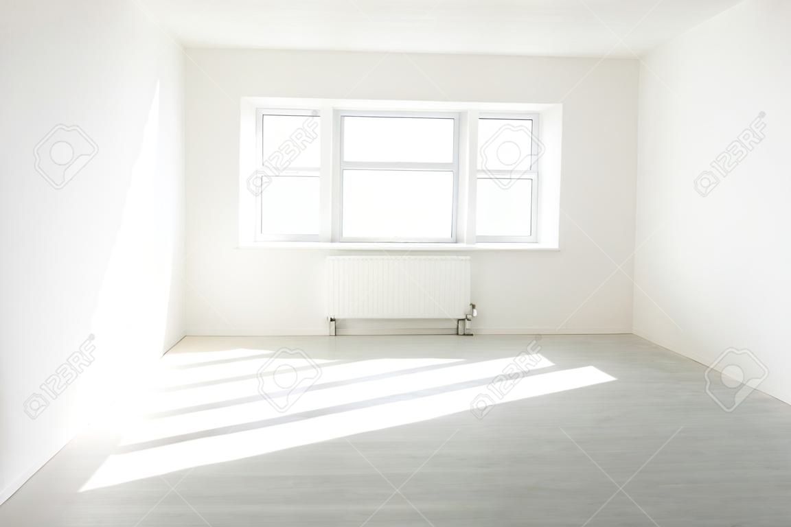 White room with window full of light